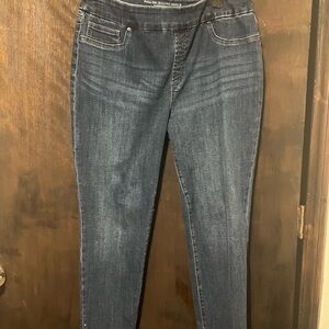 Chico's Dark Blue Jeggings eith sparkles on the bottom of the legs